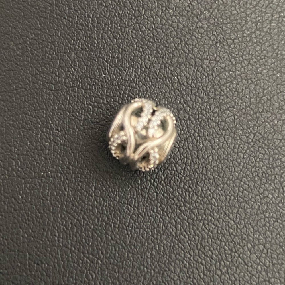 Pandora Essence Caring charm 925 sterling silver. NWOT